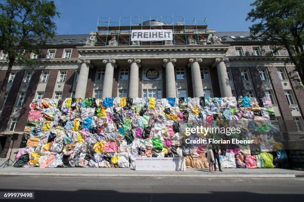 During the unveiling of the new art project 'Freiheitswand' in front of the Andreas Quartier on June 22, 2017 in Duesseldorf, Germany. The conceptual...