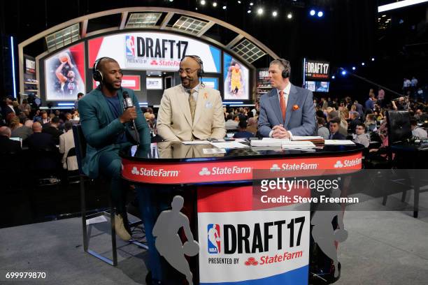 Chris Paul of the LA Clippers joins Dennis Scott and Rick Kamla on the NBA TV set before the 2017 NBA Draft on June 22, 2017 at Barclays Center in...