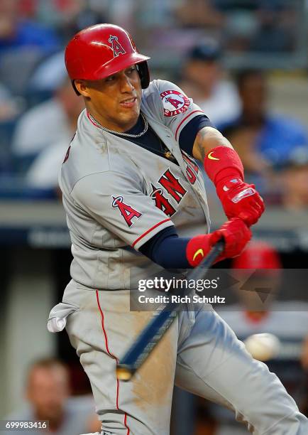 Yunel Escobar of the Los Angeles Angels of Anaheim hits an RBI single in the third inning against the New York Yankees during a game at Yankee...