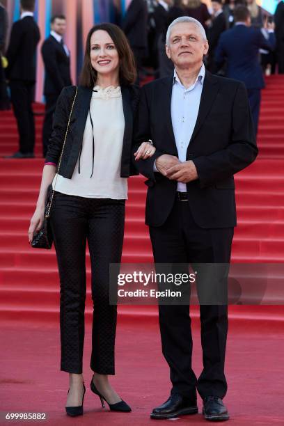 Actor, director Alexander Galibin and his wife, actress Irina Savitskova attend opening of the 39th Moscow International Film Festival outside the...