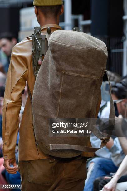 Model, bag detail, walks the runway during the Boris Bidjan Saberi Menswear Spring/Summer 2018 show as part of Paris Fashion Week on June 22, 2017 in...