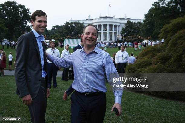 Jared Kushner, son-in-law and senior advisor to President Doanld Trump, shares a moment with White House Chief of Staff Reince Priebus during a...