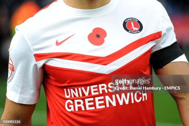 Charlton Athletic's Johnnie Jackson with a poppy stitched into his shirt