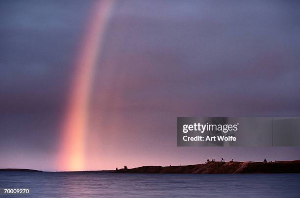 rainbow over lake, yellowknife region, northwest terrirories, canada - yellowknife canada stock pictures, royalty-free photos & images