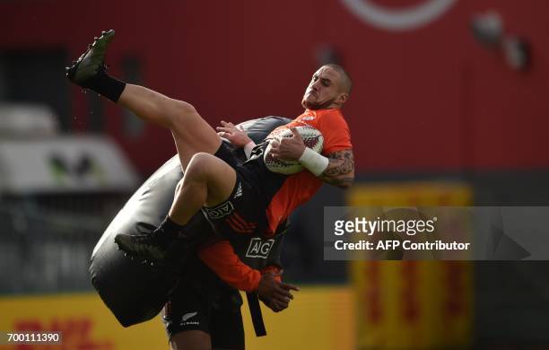 New Zealand's All Blacks TJ Perenara takes part in the Captains Run ahead of the first rugby Test against the British and Irish Lions in Auckland on...