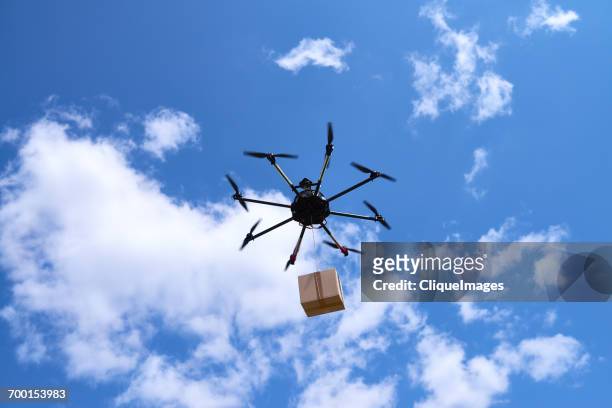 drone delivery - cliqueimages stock-fotos und bilder