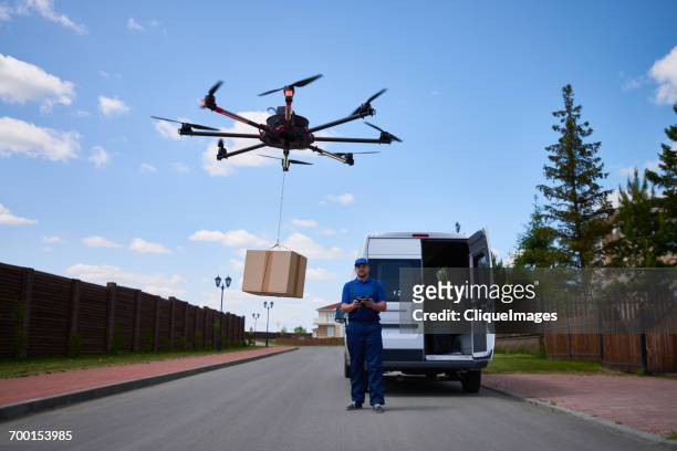 drone delivery of goods - cliqueimages stock-fotos und bilder