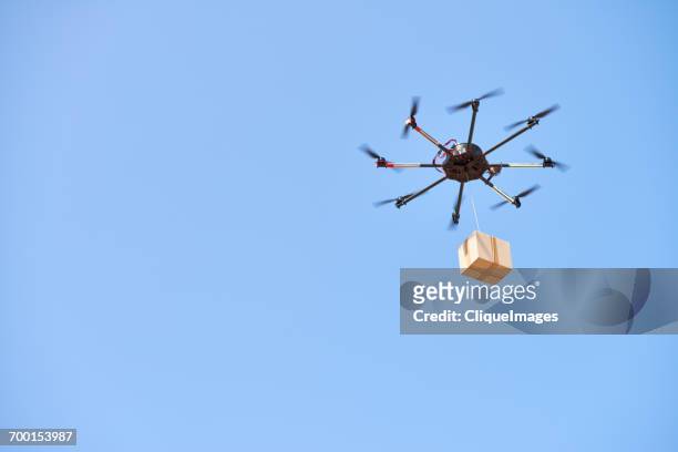 drone delivery service - cliqueimages stock-fotos und bilder