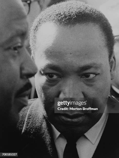 Martin Luther King Jr. And Rev. Ralph Abernathy confer in Montgomery at the culmination of the Selma to Montgomery march, March, 1965.