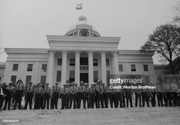 Police on the steps of the Alabama State Capitol in Montgomery at the culmination of the Selma to Montgomery march. March, 1965.