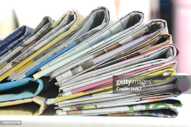 newspaper bundle - materiale cartaceo foto e immagini stock