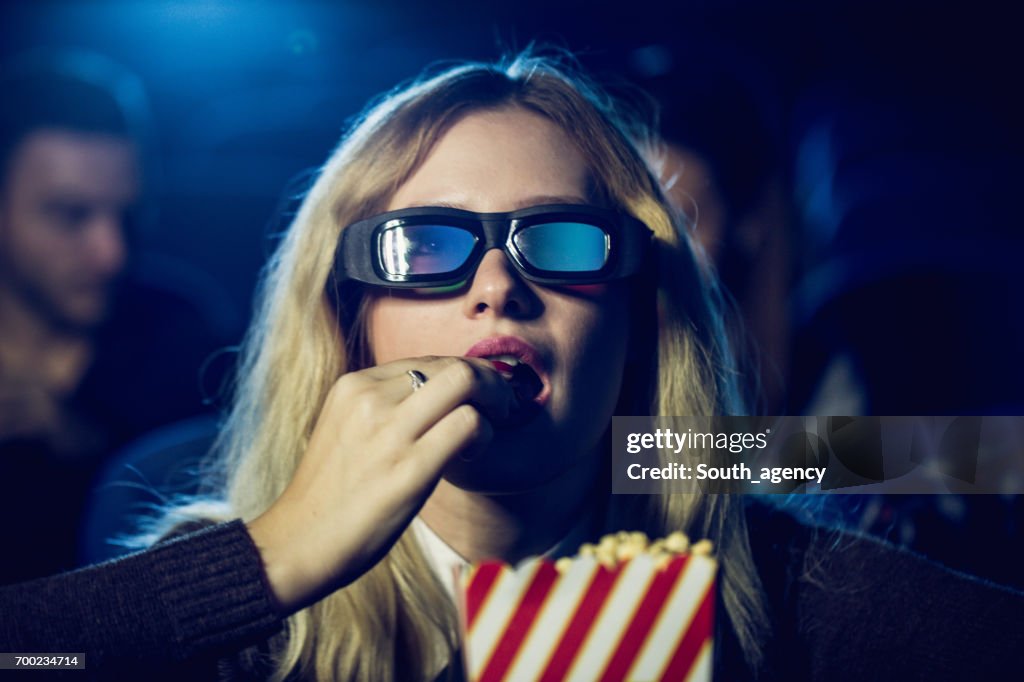 Eating popcorn in movies