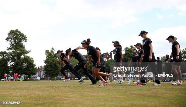 Surrey players warm up before the game