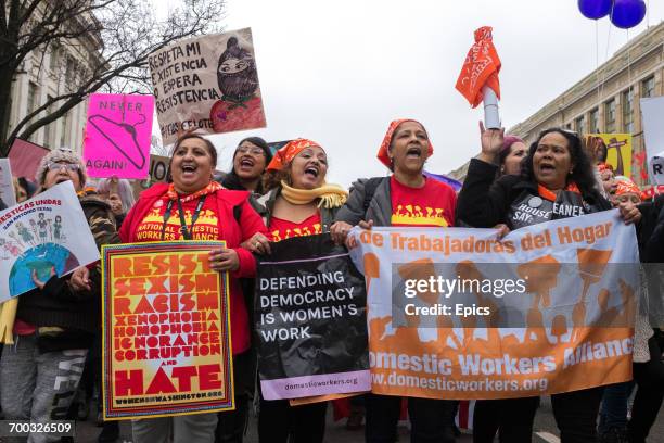 Protestors march as part of the Women's March which nationwide campaigned for legislation and policies regarding human rights, women's rights,...