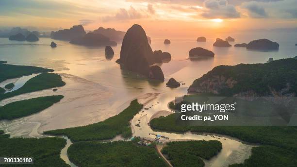 sunrise at phang nga bay, phang nga, thailand. - james bond island stock pictures, royalty-free photos & images