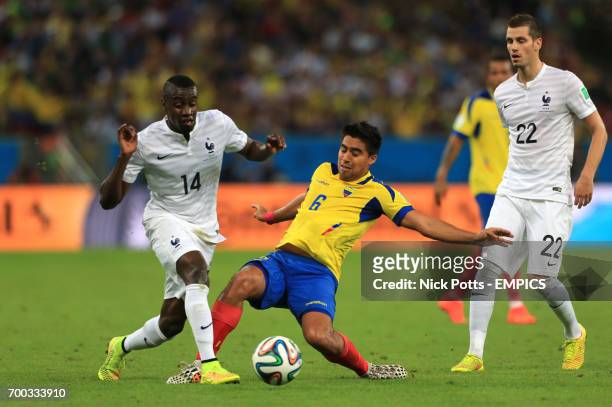 Ecuador's Christian Noboa and France's Blaise Matuidi battle for the ball