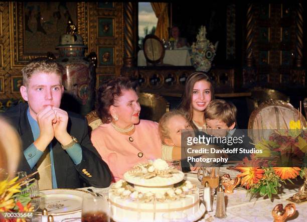 View of members of the Trump family as they sit at a table together during Thanksgiving dinner at the Mar-a-Lago club, Palm Beach, Florida, November...