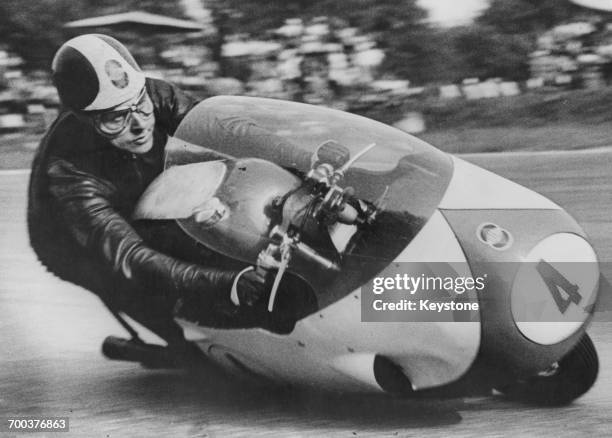 Italian motorcycle racer Libero Liberati riding a Gilera to victory in the 500cc class at the Nations motorcycle Grand Prix at Monza, 1st September...
