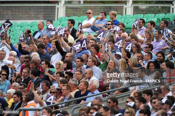 Fans soak up the atmosphere in the stands at the Kia Oval