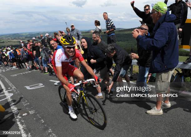 Confidis rider Nicolas Edet makes his way to the summit ahead of the main peloton as stage two of the Tour de France passes over Holme Moss Moor,...