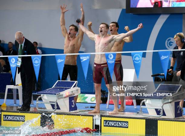 England's Adam Brown , Chris Walker-Hebborn, Adam Peaty and Adam Barrett celebrate winning the gold medal in the Men's 4 x 100m Medley Relay Final