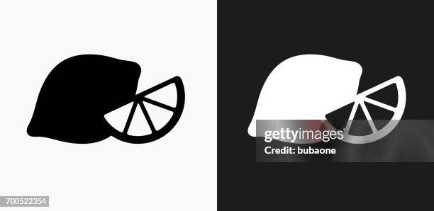 lemon icon on black and white vector backgrounds - lemon black background stock illustrations