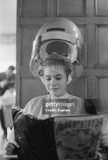 Relative of Sir Bernard Waley-Cohen, the new Lord Mayor of London, during a visit to the hairdresser, London, November 1960.