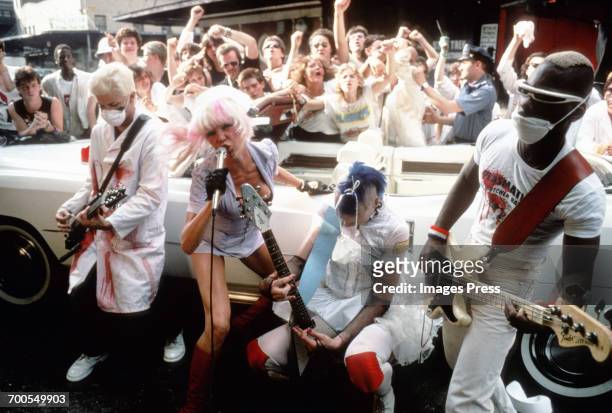Wendy O. Williams and her Plasmatics bandmates film scenes for a music video circa 1980 in New York City.