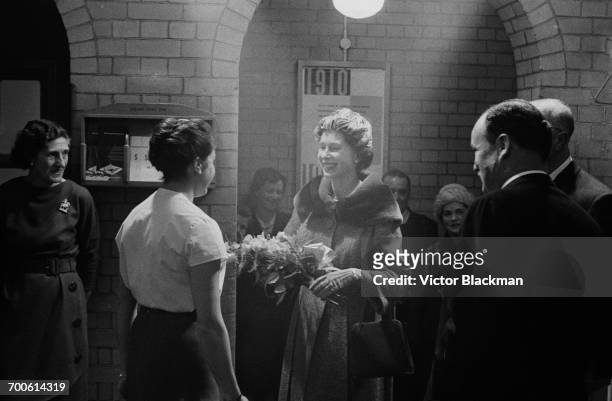Queen Elizabeth II visits Holloway Employment Exchange in London, 17th November 1960.