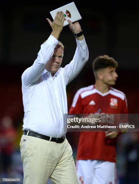 Southampton manager Ronald Koeman applauds the away fans after the pre-season friendly match at The County Ground, Swindon