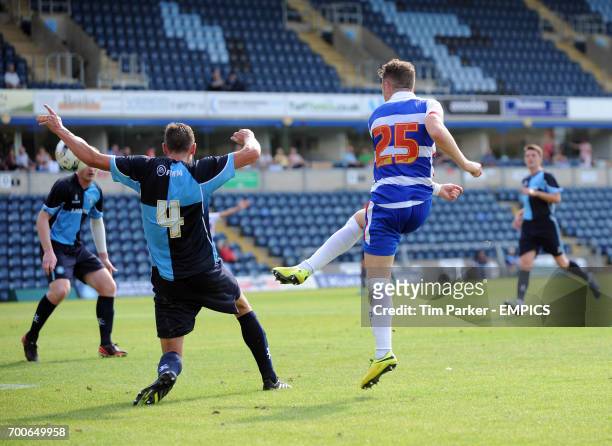 Reading's Jake Taylor has a shot on goal