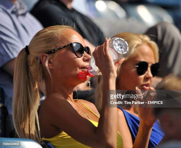 Reading's Pavel Pogrebnyak wife Masha cools down with a water bottle during the game