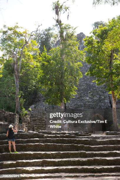 ruins at the ancient mayan city of coba, yucatan peninsula, mexico - cultura maya stock-fotos und bilder