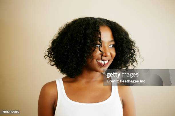 portrait of smiling mixed race woman - naturligt hår bildbanksfoton och bilder