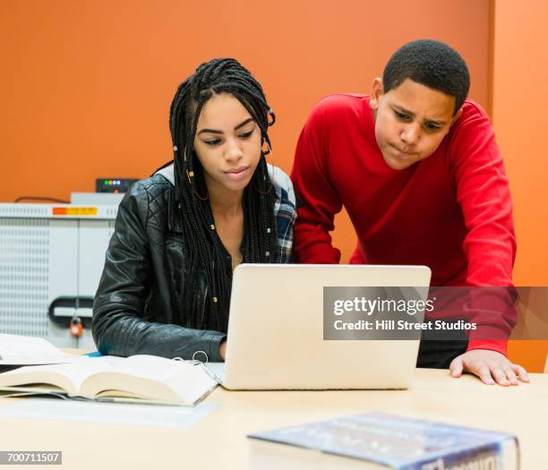 students studying with laptop - tensed idaho stock pictures, royalty-free photos & images