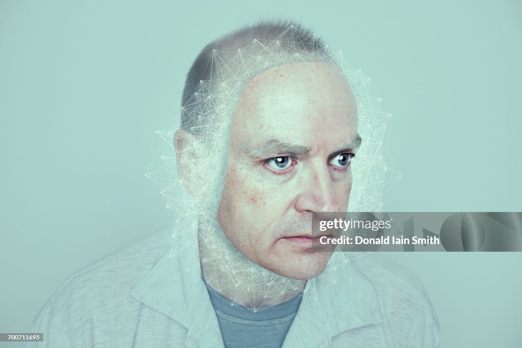Face of Caucasian man in cyberspace