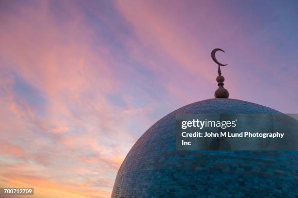dome of mosque at dusk - uzbekistan mosque stock pictures, royalty-free photos & images