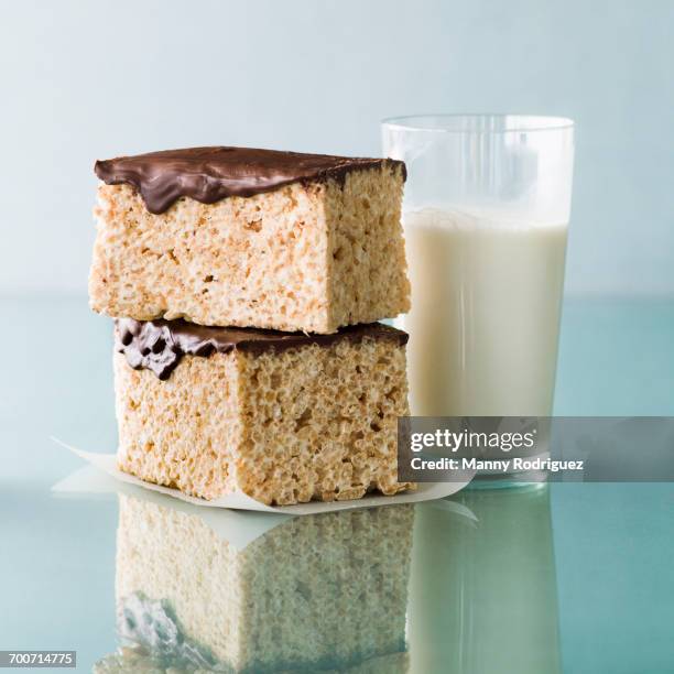 stack of rice cakes with chocolate icing and milk - chocolate square stock pictures, royalty-free photos & images