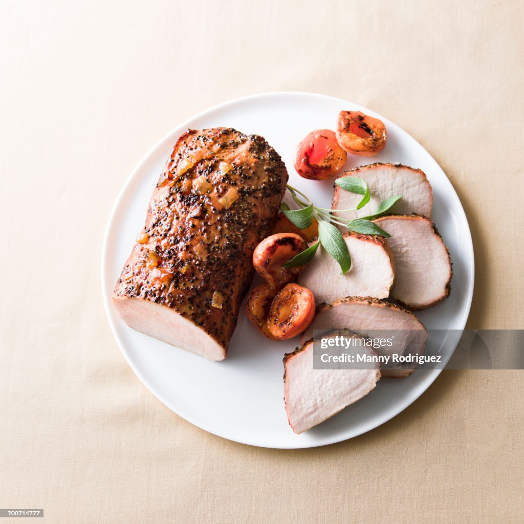 Sliced pork on plate