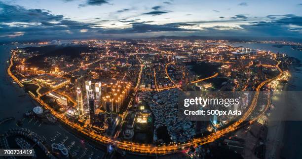 illuminated city at dusk - xiamen fotografías e imágenes de stock