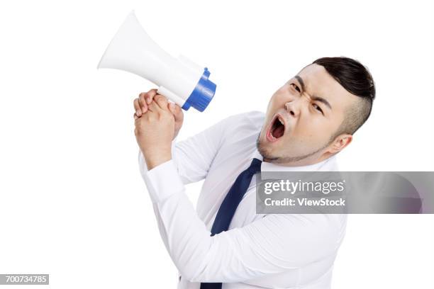 the fat man with a megaphone shouting business - unhappy salesman stock pictures, royalty-free photos & images