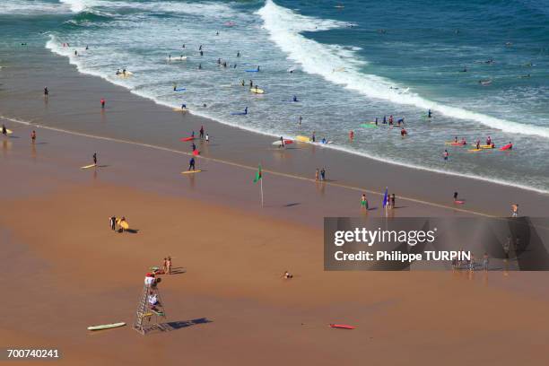 france, basque country, biarritz. people on plage des basques. - surf rescue stock pictures, royalty-free photos & images