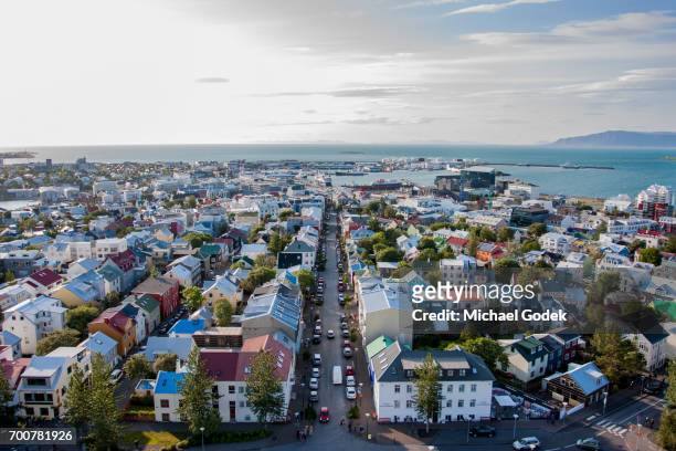 aerial view of reykjavik iceland with ocean in the distance - reykjavik iceland stock pictures, royalty-free photos & images