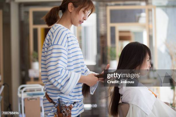 beauticians and customers - striped towel stock pictures, royalty-free photos & images