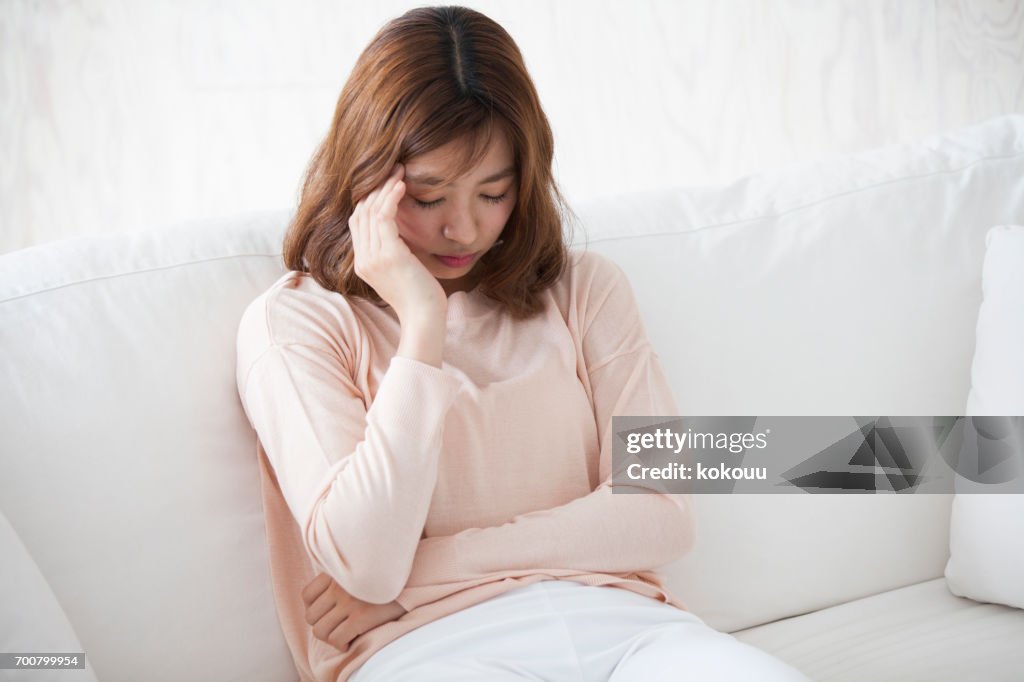 Woman sitting on a couch