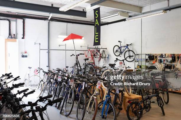 bicycles in bike shop - sports equipment store stock pictures, royalty-free photos & images