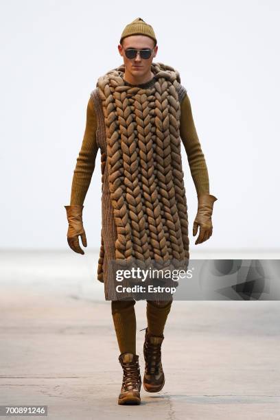 Model walks the runway during the Boris Bidjan Saberi Menswear Spring/Summer 2018 show as part of Paris Fashion Week on June 22, 2017 in Paris,...