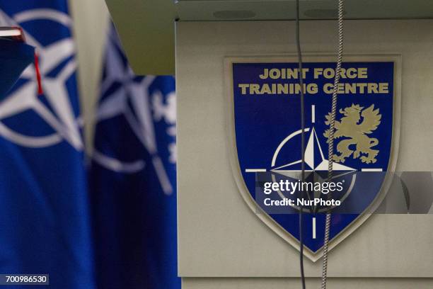 The shield and logo of the NATO Joint Force Training Centre is seen ahead of a press conference on the CWIX interoperability training weeks in...