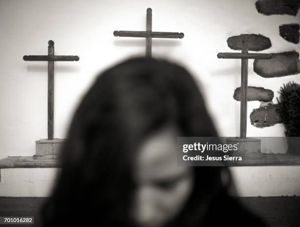 girl in church of virgen de la candelaria, tijarafe, la palma. spain. - virgen de la candelaria stock pictures, royalty-free photos & images