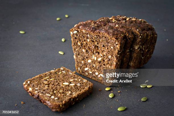 rye bread with seeds - whole wheat bread loaf stock pictures, royalty-free photos & images